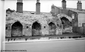 The section of the city walls in front of the Chapelfield Mall. At the time of this photograph (1957) the site behind the wall was home to the Mackintosh factory producing chocolate and confectionery. 